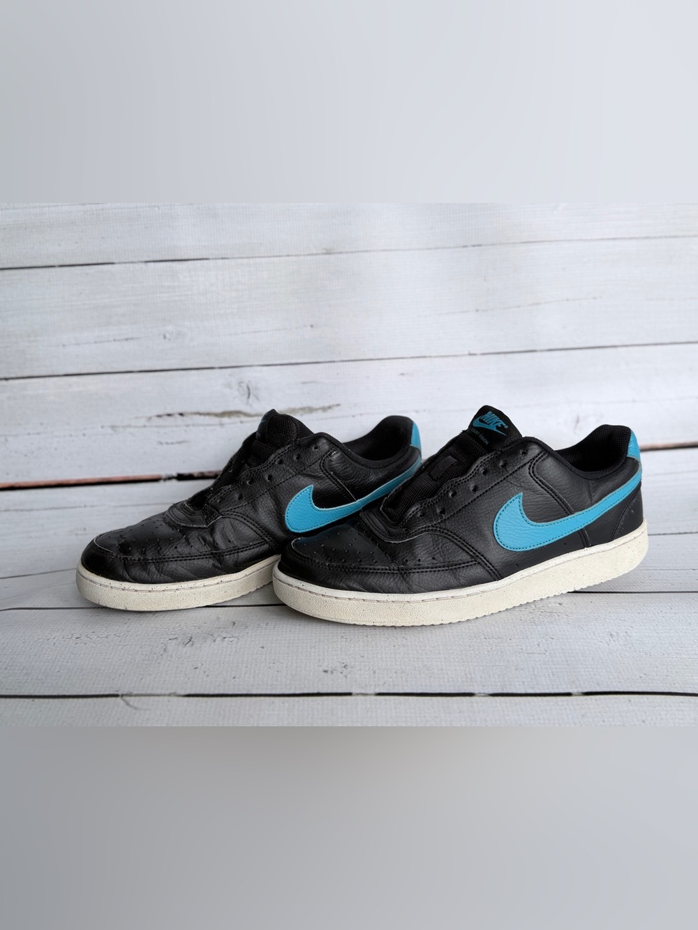 Nike Men’s Black Sneakers with Blue Swoosh